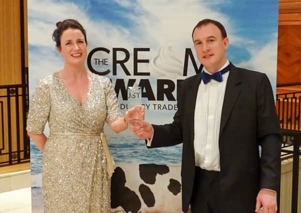 Dairymaster duo Kerry lady Lisa Herlihy, Marketing Manager & Tipperary man Ted McGrath, UK Sales Manager with the prestigious Cream Innovation 2016 award