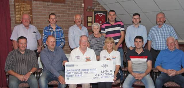 The NI Simmental Cattle Breeders' Club has raised Â£3,500 to the NI Children's Hospice based in Killadeas. Office bearers and committee members presented the cheque to fund raisers John Graham and Yvonne Bowles.