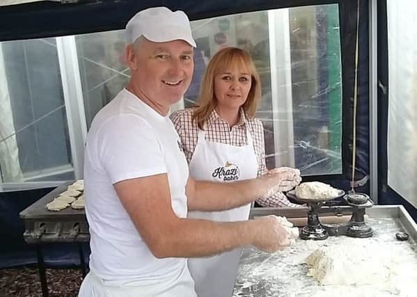 Agriculture Minister Michelle McIlveen with Mark Douglas at the National Ploughing Championships Co Offaly. The Minister joined Mark to make soda bread, one of the many local products and producers showcased at the agricultural event