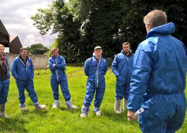 Members of Kilrea Dairy BDG discussing grazing management on Arnold BoyceÂ’s farm in Garvagh in June 2016. The group is facilitated by Alan Agnew