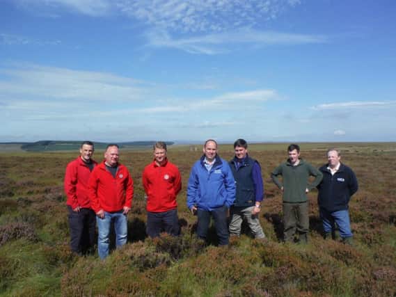 Representatives from NIFRS, CAFRE, IGCT and NIEA making final preparations for the Heather Management Event at Greenmount Hill Farm on 30 September 2016.