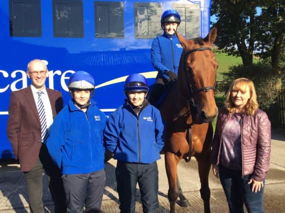 DAERA Minister Michelle McIlveen pictured during a visit to CAFRE Enniskillen with Seamus McAlinney, Head of Equine, and students Elisha McAteer, Maisie Gibson, and Nicole Bannon on 'Julio and Me'.