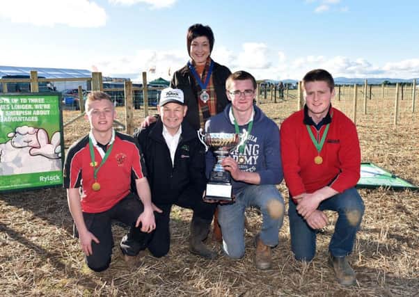 Winners of the YFCU Advanced Fencing Competition, Derg Valley YFC are pictured with Paul Bennington from sponsor AH Ward and Boyd and YFCU President Roberta Simmons
