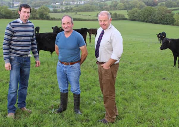 Out on farm: Tassagh beef producer Larry Nugent (centre) with Linden Foods' Wilson Giffen (left) and Frank Foster
