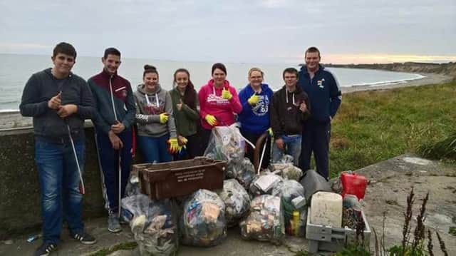 Members of Mourne Young Farmers' Club who took to Kilkeel harbour to help clean up all the rubbish