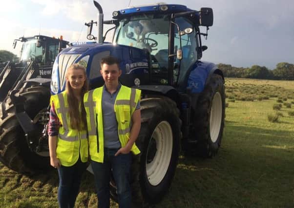 Members of City of Derry YFC Chloe McNeely and Matthew Lynch ready for the tractor run to start