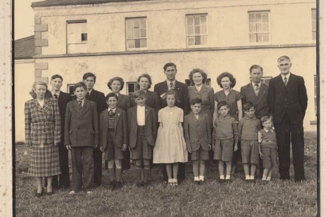 An archive image of the Donnelly family pictured outside their Collegelands home. True North: The Worlds Oldest Family will be shown on BBC One Northern Ireland on Monday 31 October at 10.45pm