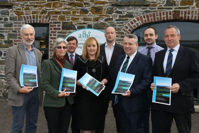 .Members of an expert working group present DAERA Minister Michelle McIlveen with a report on Sustainable Agricultural Land Management Strategy for NI. Pictured (left-right) are; Patrick Casement, Sue Christie, James Brown, Minister Michelle McIlveen, Jonathan Birnie, John Gilliland, Martyn Blair and John Best.