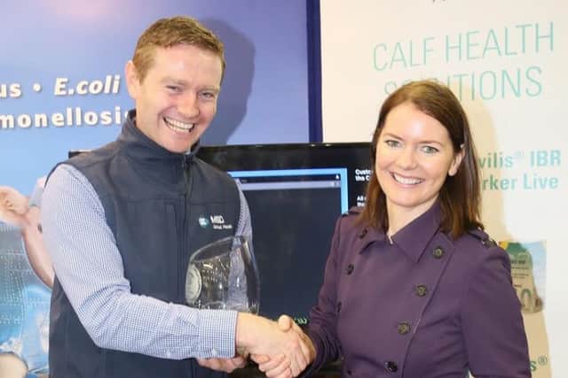 Dr William Minchin MSD Animal Health receives the award for Â‘Best Trade StandÂ’ from Catriona Buckley of The Irish Examiner at the National Dairy Show 2016 held in Millstreet Co Cork