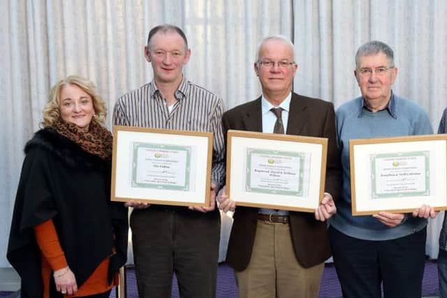 Spring Barley:  L to R is Wendy Fearon (Sponsor Clarendon Agri-care) Jim Fulton (2nd Place) Raymond Wilson (1st Place) Jonathan and Neill Coleman (3rd Place) and John McKee (UFU)