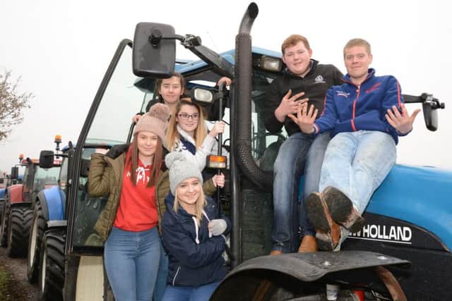 Jonathan Knight, Matthew Burley, Jemma Downes, Chloe Hall, Rebekah Haffey and Leah Johnston, wait for the start of the inaugral Mountnorris Young Farmers Club Tractor Run, in aid of B.R.A.K.E. Charity and Mountnorris Young Farmers Club.  Â© Photo: Gary Gardiner.