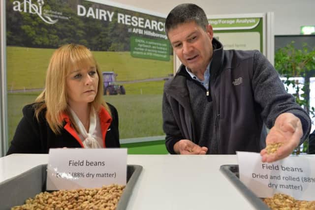 Agriculture Minister Michelle McIlveen on the AFBI stand at the RUAS Winter Fair today with Dr Conrad  Ferris
