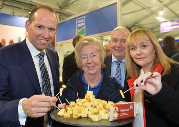Agriculture Minister Michelle McIlveen visits the Dale Farm stand at the RUAS Winter Fair. Pictured with the minister are Dale Farm Chief executive Nick Williams(L) , United Dairies Chairman John Dunlop and Margaret Sherrard from Dale Farm