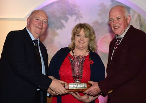 Henry Savage and Jim Quail made a presentation to Heather Hume in recognition of the outstanding work that she had undertaken during her time as secretary of the NI Limousin Club