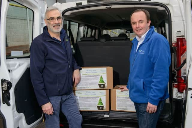 Rural Support Chief Executive Jude McCann  (left) and Simple Power Chief Executive Philip Rainey (right) at the recent Rural Support Christmas Hamper Scheme which delivered over 100 hampers to help hard-hit families throughout Northern Ireland over the festive period