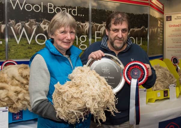 Competition champions Jayne and Myrfyn Roberts with the winning Bluefaced Leiceter fleece