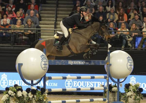 Billy Twomey on his way to victory at Liverpool International Horse Show