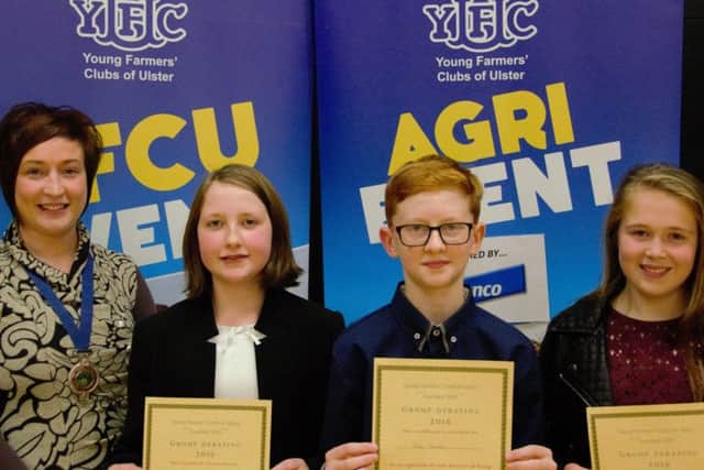 Pictured is the winning 12-14 category group debating team, Ivanna Strawbridge, Aaron Kennedy and Francesca Boyd pictured with Roberta Simmons, YFCU President.