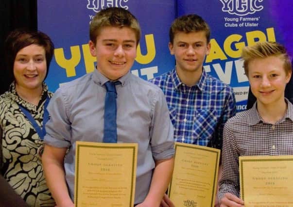 Pictured is the winning 14-16 category group debating team, James Currie, Mark McNeill and Robbie McNeill pictured with Roberta Simmons, YFCU President.