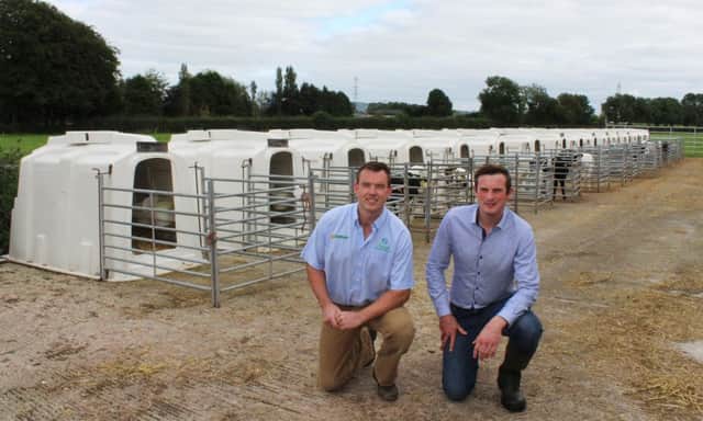Teemore Engineering's Adrian Bates (left) on farm with Co Antrim dairy farmer Sam Hill, who has made extensive use of Agri-Plastics' calf hutches