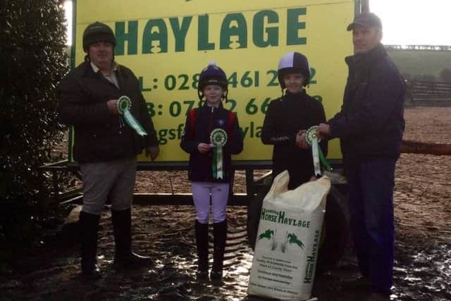 Old and new generations in the prizes in the 75cm class with Eric Pele: Pictured, right to left are 1st, Leo McGarry;  2nd, Katelyn Thomas and 3rd Bartley Murphy, Downpatrick businessman and former jockey to top trainer Noel Meade