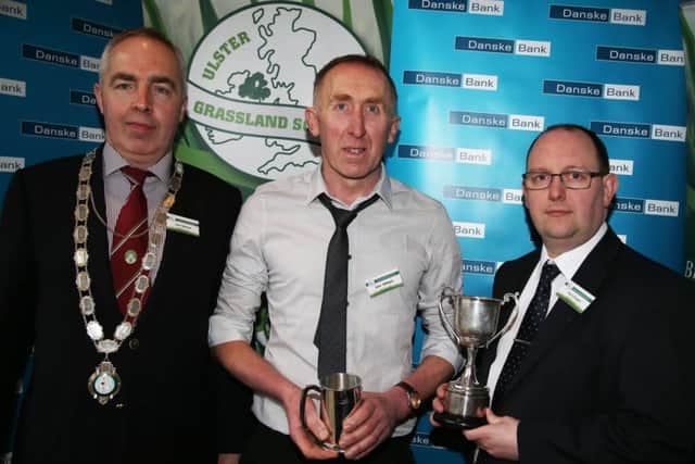 John Mulligan Overall Grassland runner up with Paul Clingan and Sam Watson President UGS at the conference in Dunsilly Hotel Antrim on Tuesday. PICTURE KEVIN MCAULEY/MCAULEY MULTIMEDIA