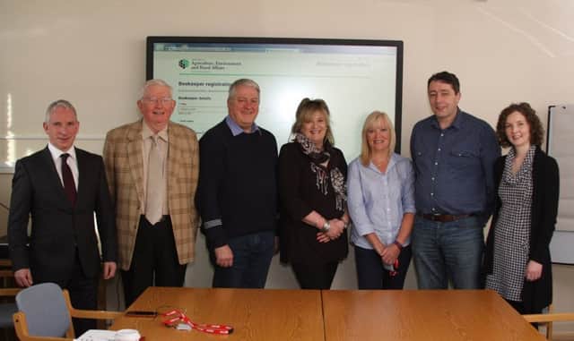 Representatives from the Institute of Northern Ireland Beekeepers (INIB) and the Ulster Beekeepers Association (UBKA) meet with Forest Service Plant Health Inspection Branch to launch the online beekeepers registration system. From left to right: John Finlay DAERA Forest Service,  Tom Canning INIB, John and Susie Hill, UKBA, Valentine Hodges, INIB, Tom Williamson and Fiona McKenna, DAERA Forest Service