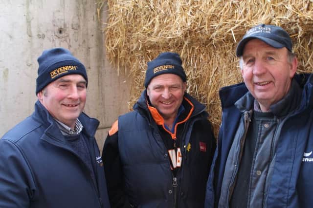 Paul and Ian Agnew from Caledon have a chat with host farmer Norman Morton at the RMS open day