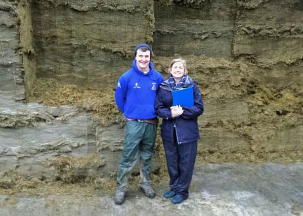 The winner of the YFCU silage making competition James Purcell from Dungiven YFC is pictured with judge Mary Jane Robinson from John Thompson and Sons, sponsor of the competition