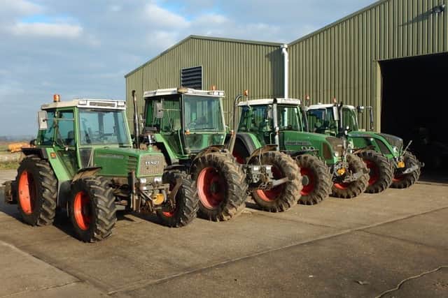 Some of the tractors which were auctioned at Cheffins on site auction for Darby Methwold near Thetford