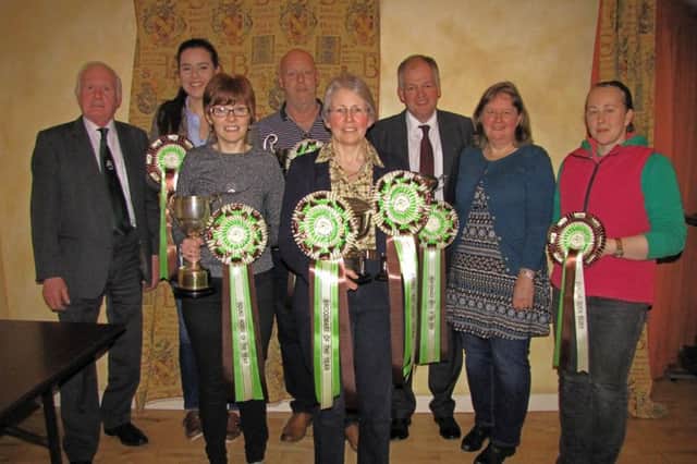 Members of the Irish Draught Horse Society in Norther Ireland collected awards for their most successful Irish Draught animals of the year at the recent AGM. (l to r) Tom McGuigan (Chairman), Kathryn Knox (Performance Highly Commended), Wendy Bell (on behalf of Grace Irwin's Yearling), Kenny Bell (Younghorse), Charlotte Moore (Foal and Broodmare), Robert and Jane Huey (Performance) and Amanda Wright (Performance Highly Commended).