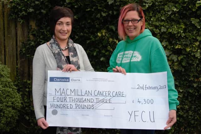Young Farmers Clubs of Ulster president Roberta Simmons is pictured presenting a cheque for Â£4,300 to Macmillan Cancer Supports fundraising manager Joanne Young after the YFCUs Got Talent presidents event
