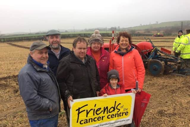 Society member John Lyons (second left) pictured with local ploughing enthusiasts at ListooderÂ’s charity ploughing match in Ardglass on Saturday. All proceeds were donated to Friends of the Cancer Centre
