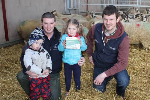Philip Whyte took the opportunity of checking his pre-lambing ewes earlier this week in the company of his son Jack and daughter Ella. They were joined by Provita's Kieran Donnelly (right)