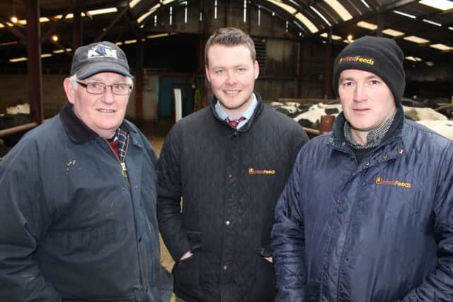 Host farmer Alex Brown with United Feeds Andrew Fyffe and Martin Clarke