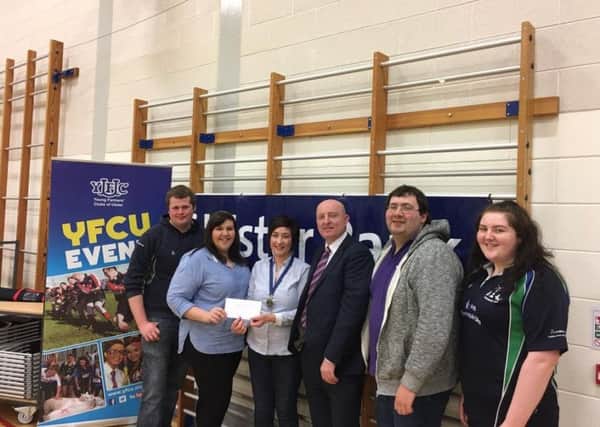 The Donaghadee YFC team who were awarded 1st place in the NI Quiz, Kelsie Crawford, Philip Donaldson, Jane Kilpatrick and Stuart Rea receiving their prize of Â£300 from Martin Convery, Business Development Manager, Ulster Bank and Roberta Simmons, YFCU President and quiz master for the evening