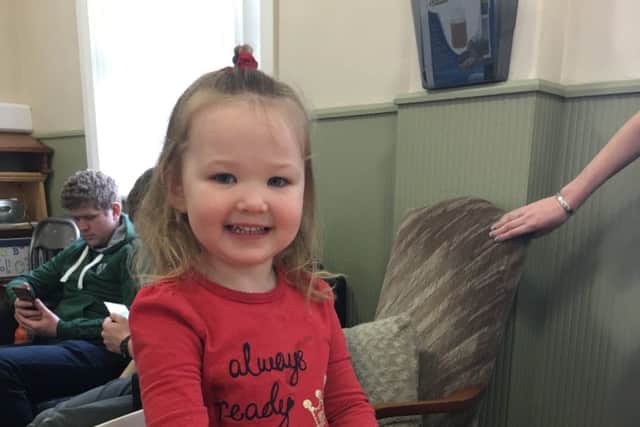 Little Kathleen is all smiles, enjoying the sweet treats at Garvagh Young Farmers' Club's coffee morning