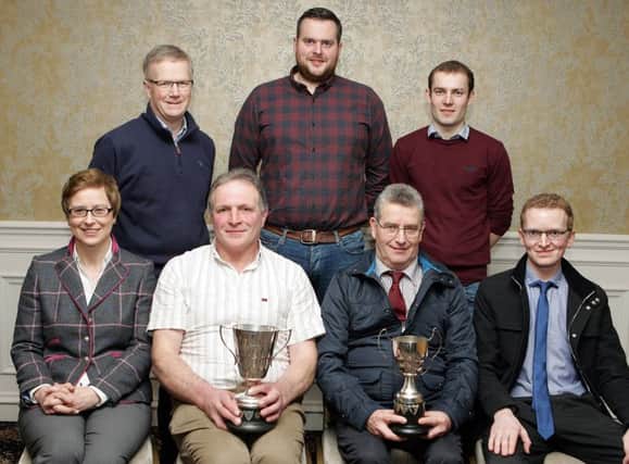 Prizewinners in the Fermanagh Grassland Club's 2016 Vaughan Trust, Grazing Competition (front, from left) Olwen Gormley, Vaughan Trust, who presented the awards; Robin Clements, winner of the Stevenson Cup and Crystal Bowl as overall winner; Robert McCrea, winner of the Todd Cup, and Nigel Gould, competition judge (back row) Philip Clarke, Jason Elliott and Nigel Graham.