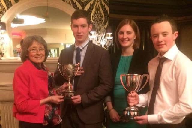 Ulster Young Farmer cups, left to right are Pippa Moore, over 18 cup, Gordon Crockett, Diane Smyth, under 18 cup, and Jack Gamble