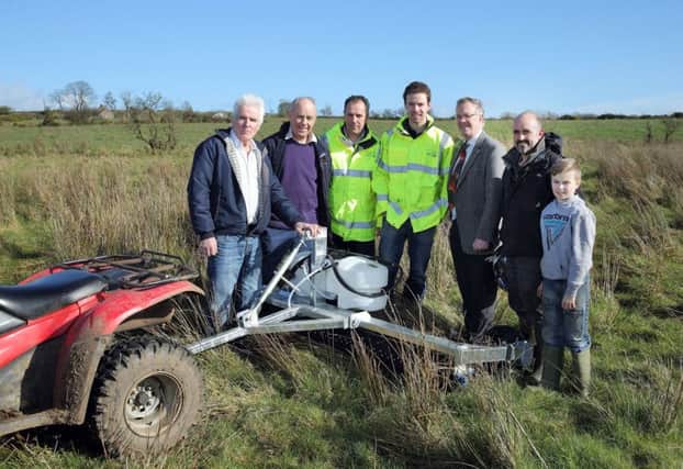 NI Water, in conjunction with the Water Catchment Partnership, launched a free weed wiping project in the Armagh area between May and September 2017 and 2018.  This pilot scheme is aimed at farmers tackling rush weeds in the catchment area of Seagahan Reservoir near Markethill.   Pictured are  Gerard Hughes (farmer), George McCall (farmer), Roy Taylor, Dominic McCann, Ivor Ferguson (UFU deputy president), Kyle McCall (farmer) and his son Rhys McCall.