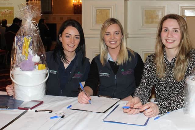 Making preparations for the raffle of lambing supply packs at the Conference are Parklands Veterinary Group personnel, Karuna Gourley, Megan Dallas and Heather Steele