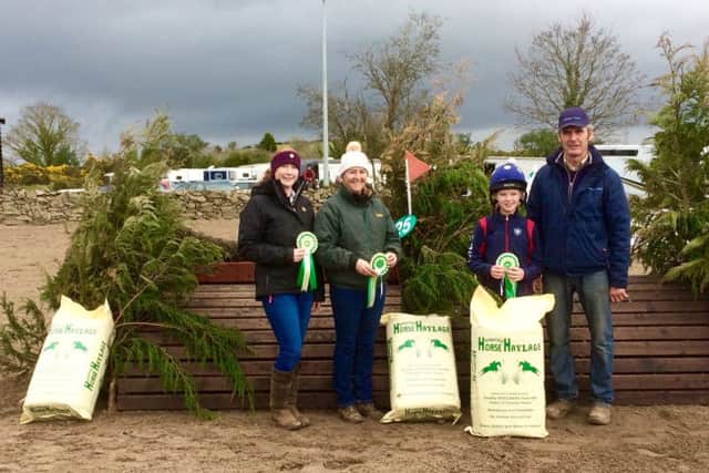 Winners in the 75cm class, from right to left, Eric Pele with winner Katelyn Thomas along with representatives of Rachel Moore who were second and third respectively