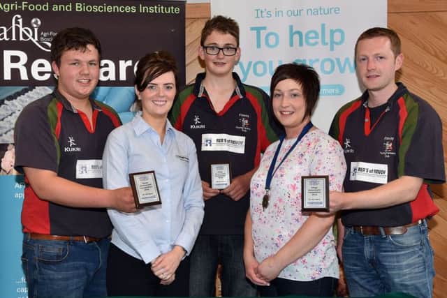 Some of the winners from the silage assessment finals 2016 (left to right): Philip Beattie, first in the 16-18 age category, Carolyn McKendry from sponsor John Thompson & Sons, Gavin Finney, first in the 14-16 age category; YFCU president Roberta Simmons and David Dunlop, first in the 25-30 age category
