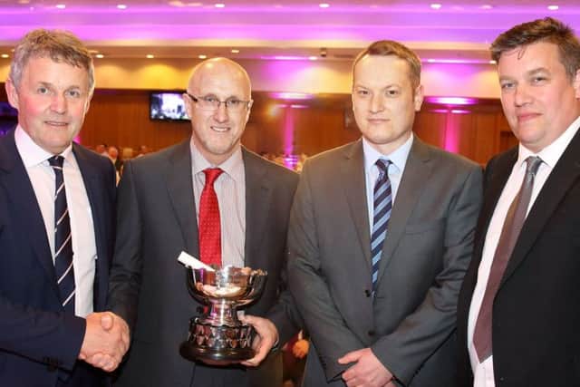The UFU Armagh Down Group was awarded the Mary Wilson Trophy for the best overall UFU group performance in 2016. Pictured accepting the trophy is Howard Quin, Chris Donaldson and Paul Bennett of the UFU Armagh Down Group with Barclay Bell, UFU president