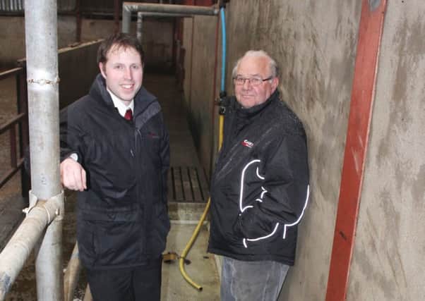 Moore Concrete's Jeff Haslett and Rex Humphrey standing in the new footbath