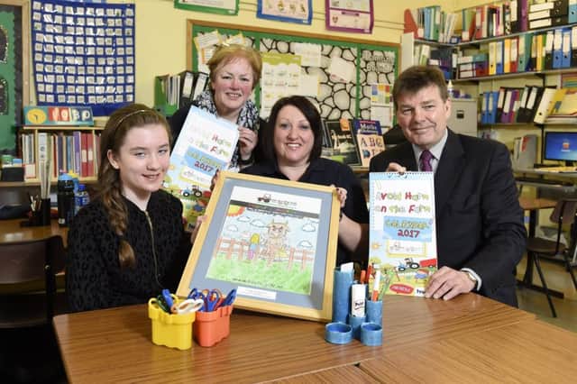 Pictured at this years launch of the Child Safety on Farms poster competition is last years winner Ilaria Toner, (formerly of St Colmcilles PS, Claudy), Bridge ONeill, Headmistress of St Colmcilles PS, Claudy, Julie Leathem, Health and Safety Executive for Northern Ireland (HSENI), and Derek Martin, the new chairman of HSENI