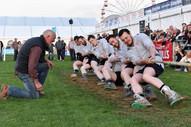 Members of YFCU taking part in the tug of war competition