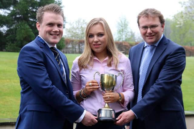 Best under 21 Ulster Young Farmer of the Year, Megan Patterson, Dungiven YFC pictured with Mark Forsythe from sponsor Danske Bank and YFCU president James Speers
