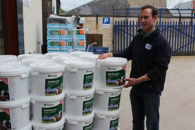 Nathan Hall unloading the latest consignment of Advance+ inoculant to arrive at Fane Valley Stores Augher outlet