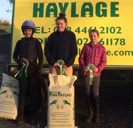 Prize winners in the 75cm on 25 April:  left to right, joint second, Leo McGarry, winner Rachael Kerr,  joint second, Emma Irwin